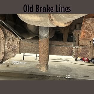 Rusted old brake lines under a vehicle before repair at Ambler Service & Repair